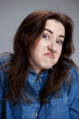 Image showing Portrait of young woman with shocked facial expression