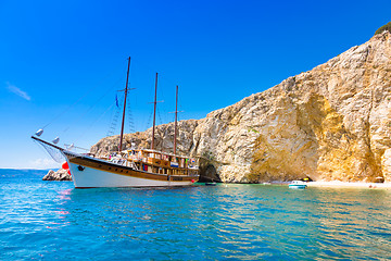 Image showing Vintage sailing boat in bay.