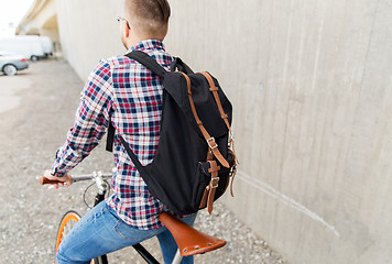 Image showing hipster man with fixed gear bike and backpack