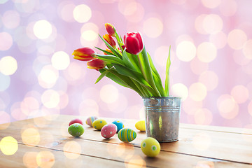 Image showing close up of easter eggs and flowers in bucket