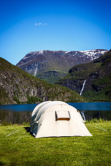 Image showing Tourist tent on the shore of the lake.