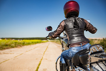 Image showing Biker girl First-person view