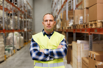 Image showing man in reflective safety vest at warehouse