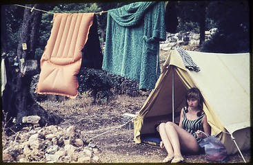 Image showing Original vintage colour slide from 1960s, young woman sitting in