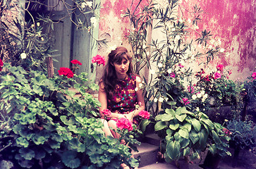 Image showing Original vintage colour slide from 1960s, young woman sitting in