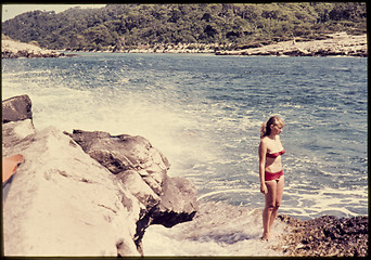 Image showing Original vintage colour slide from 1960s, young woman standing b