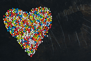 Image showing Colorful Sugar Balls in the form of heart.