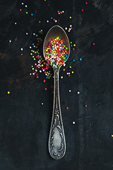 Image showing Colorful Sugar Balls in vintage spoon