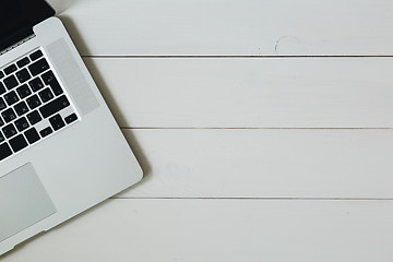 Image showing Laptop on the white wooden desk