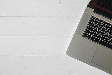 Image showing Laptop on the white wooden desk