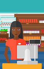 Image showing Saleslady standing at checkout.