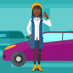 Image showing Woman holding keys from new car.