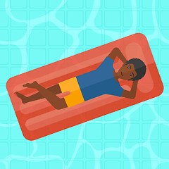 Image showing Man relaxing in swimming pool.