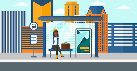 Image showing Woman waiting for bus.