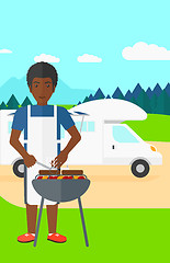 Image showing Man preparing barbecue.