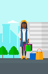 Image showing Buyer with shopping bags.