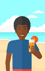 Image showing Tourist with cocktail on the beach.