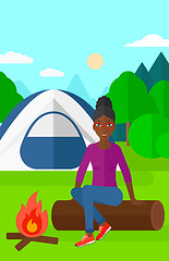 Image showing Woman sitting at camp.