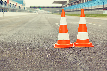 Image showing traffic cones on speedway of stadium