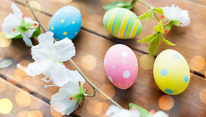 Image showing close up of colored easter eggs and flowers