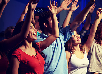 Image showing smiling friends at concert in club