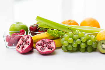 Image showing close up of fresh fruits and berries on table