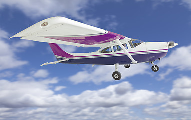 Image showing The Cessna 172 Single Propeller Airplane Flying In Sky