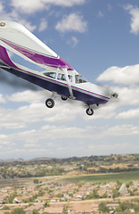 Image showing Cessna 172 With Smoke Coming From The Engine Heading Down