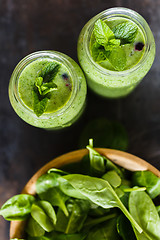 Image showing Two green smoothie in the jar