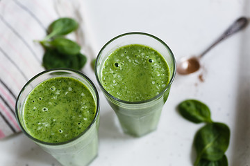 Image showing Two green smoothie in the glass