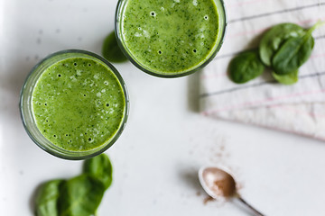 Image showing Two green smoothie in the glass