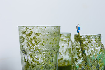 Image showing empty glasses of green smoothie