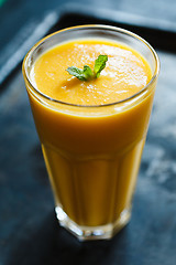 Image showing orange smoothie in the glass