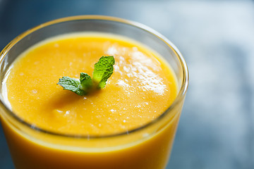 Image showing orange smoothie in the glass