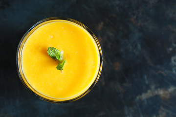 Image showing orange smoothie in the glass