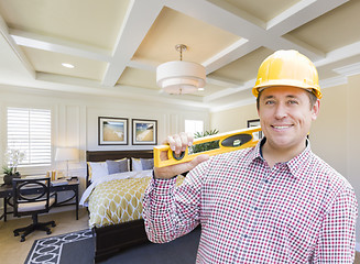 Image showing Contractor in Hard Hat Over Custom Bedroom Drawing and Photo