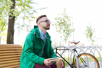 Image showing happy young hipster man with fixed gear bike