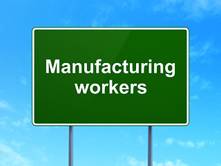 Image showing Industry concept: Manufacturing Workers on road sign background