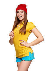 Image showing Teen funky girl standing with a frame