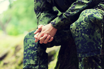 Image showing close up of young soldier in military uniform