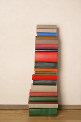 Image showing Old books on wooden floor