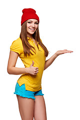 Image showing Teen funky girl standing with a frame