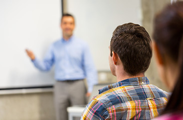 Image showing group of students and teacher in classroom