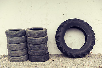 Image showing close up of wheel tires stored near wall