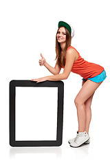 Image showing Teen funky girl standing with a frame