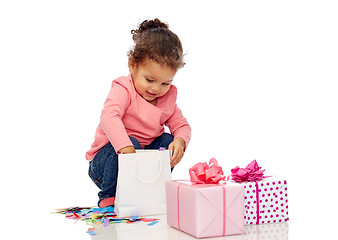 Image showing happy little baby girl with birthday presents