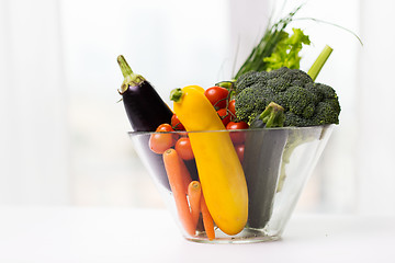 Image showing close up of ripe vegetables in glass bowl on table