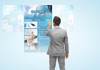 Image showing man with virtual projection of business news