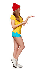 Image showing Teen funky girl standing with a frame