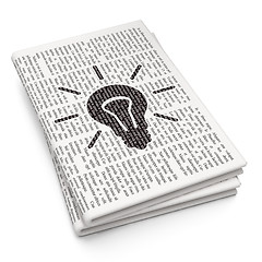 Image showing Finance concept: Light Bulb on Newspaper background